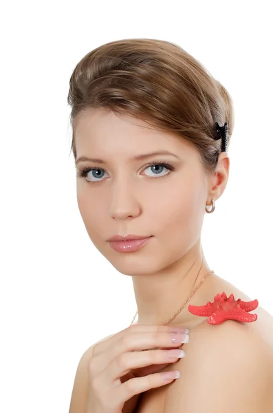 The young beautiful girl with starfish — Stock Photo, Image