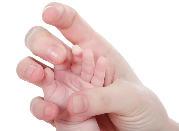 Maminka drží ruku dítěte v ruce — Stock fotografie
