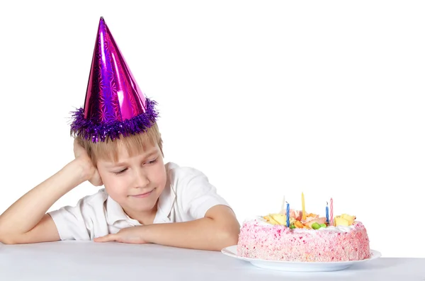 Chlapec v čepici s koláč — Stock fotografie