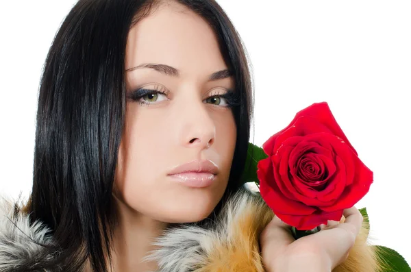 The girl with beautiful hair with a red rose — Stock Photo, Image