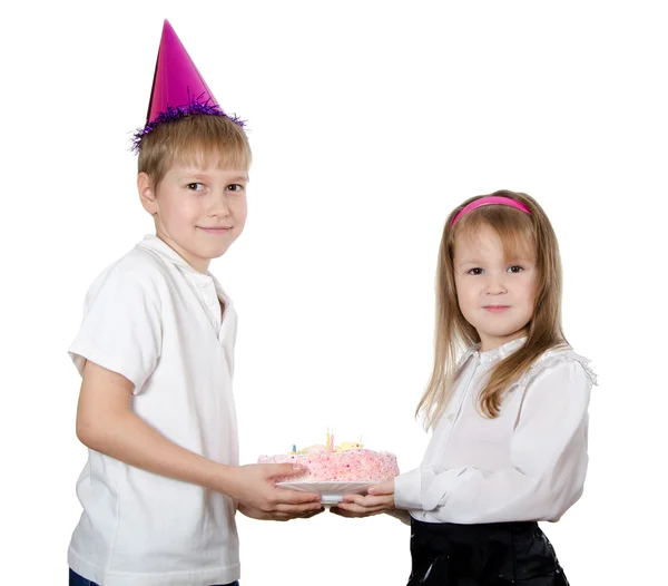 Bir pasta ile şapkalı çocuk — Stok fotoğraf