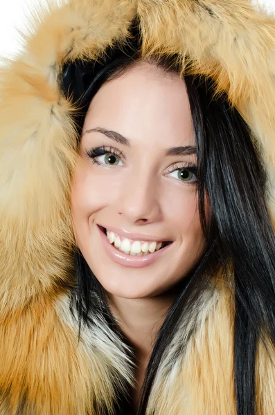Beautiful girl in a fur hood — Stock Photo, Image