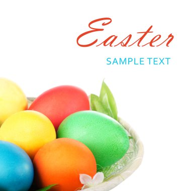 Easter colored eggs in the basket clipart