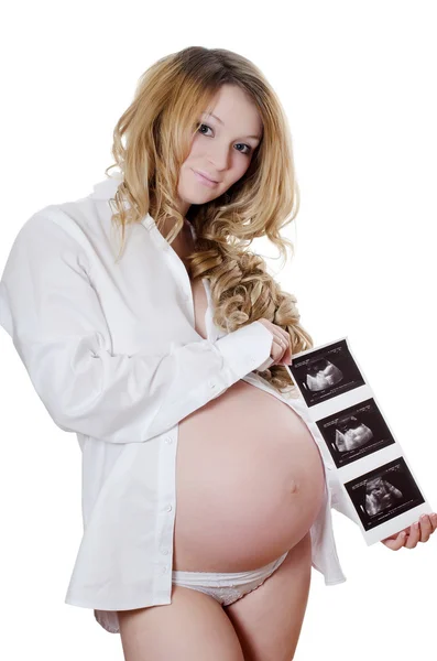 stock image The Pregnant woman holding ultrasound image