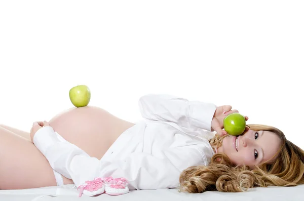 A terhes nő almával — Stock Fotó