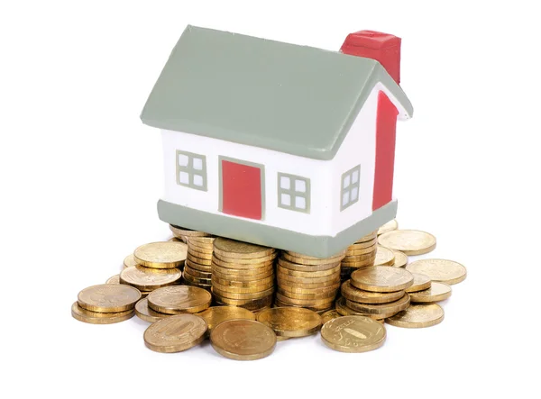 stock image Toy small house and coins