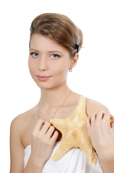 The young beautiful girl with starfish — Stock Photo, Image