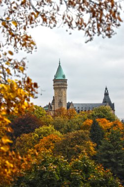 Luxembourg castle and trees in Autumn clipart