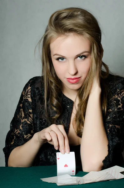 The beautiful girl with playing card — Stock Photo, Image