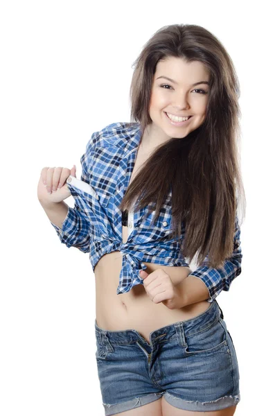 The beautiful girl in jeans shorts — Stock Photo, Image