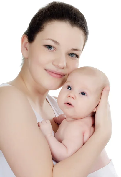 Šťastná matka s dítětem přes bílou — Stock fotografie
