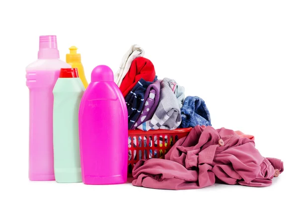 Heap of pure clothes with different detergent — Stock Photo, Image