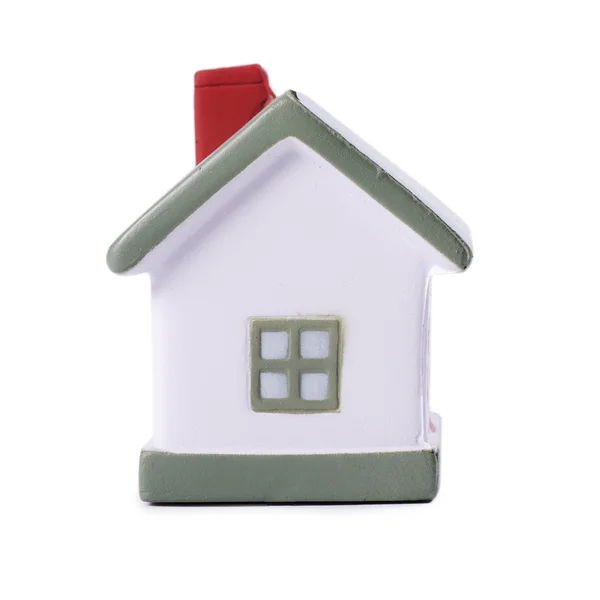 Beyaz arkaplanda izole edilmiş bir model ev — Stok fotoğraf