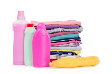 Heap of pure clothes with different detergent clipart