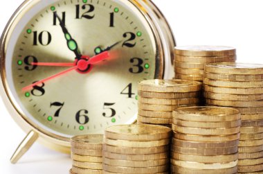 Alarm clock and money isolated on white background