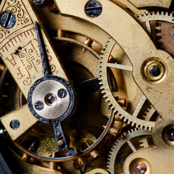 El mecanismo de un viejo reloj —  Fotos de Stock