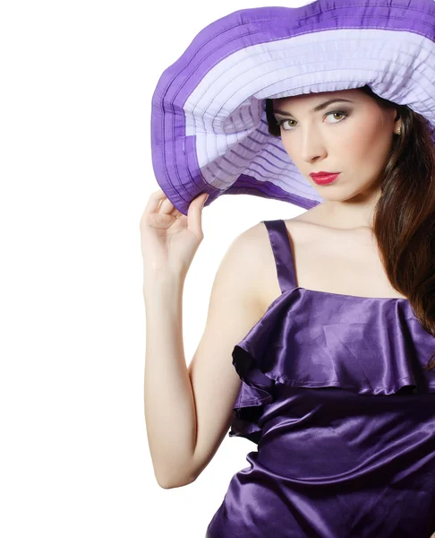 Portrait of the beautiful elegant woman in a lilac hat — Stock Photo, Image