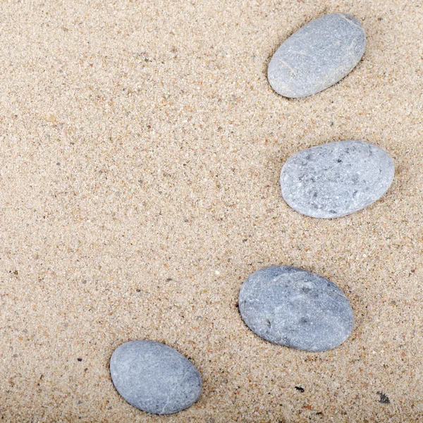 Stones on sand — Stock Photo, Image