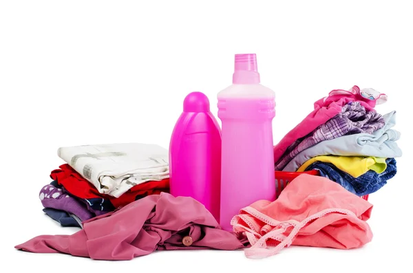 Heap of pure clothes with different detergent — Stock Photo, Image