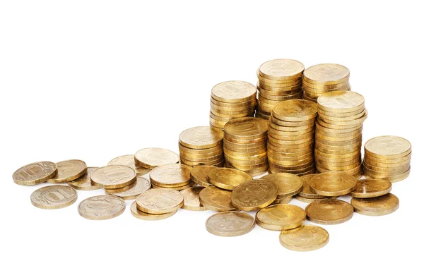 Monedas de oro en stock aisladas en blanco —  Fotos de Stock