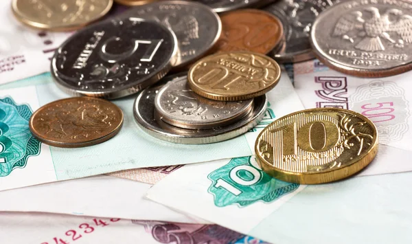 Banknotes and coins — Stock Photo, Image
