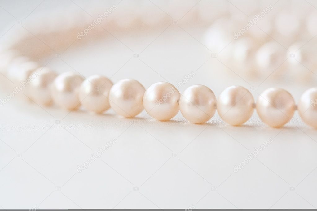 Beads from pearls. Bright lighting