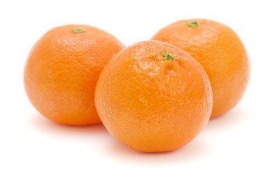 Three satsumas on white background clipart