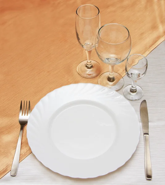 Dinner plate, knife and fork