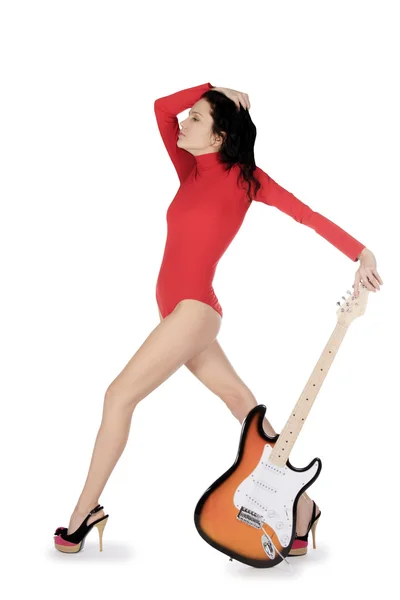 Sexy young female posing with guitar over white — Stock Photo, Image