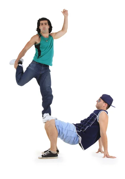 Jovens dançarinos do sexo masculino realizando uma acrobacia bboying — Fotografia de Stock