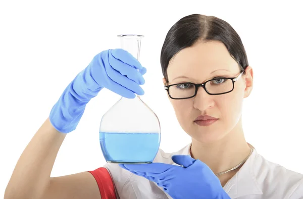 Woman conducting a chemical experiment over white — Stock Photo, Image