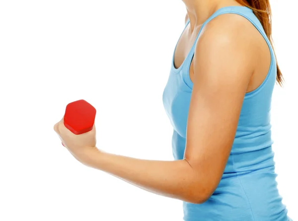 Γυναικείο χέρι με ένα κόκκινο barbell — Φωτογραφία Αρχείου