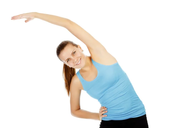 Beautiful sport woman doing power fitness exercise — Stock Photo, Image