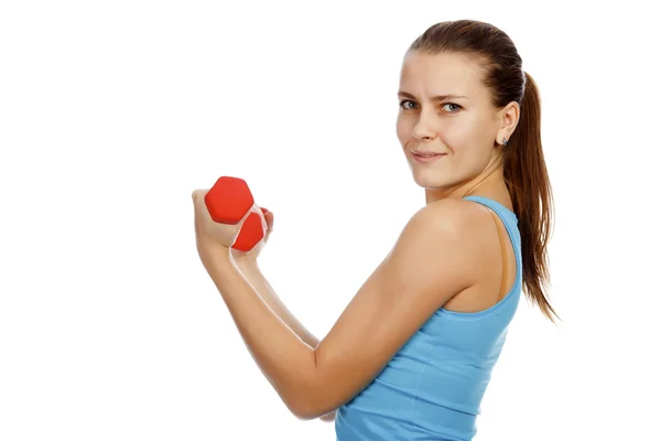 Sporty woman with red barbells on white background — Stock Photo, Image