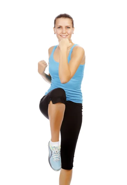 Jonge mooie fitness vrouw, geïsoleerd op witte achtergrond. — Stockfoto
