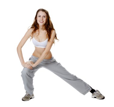 Beautiful young woman makes stretching excersize clipart