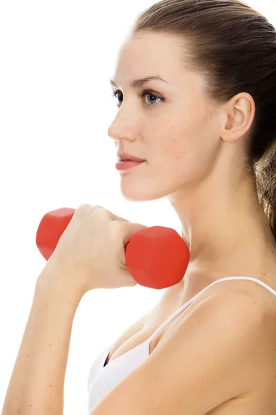 Woman with red barbell — Stock Photo, Image