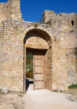 Main entrance of the castle of Loarre, Spain clipart