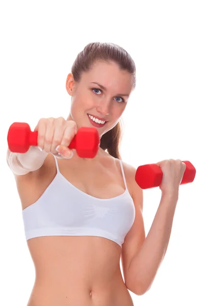 Smiling woman with barbells, focus is on the face of the girl — Stock Photo, Image