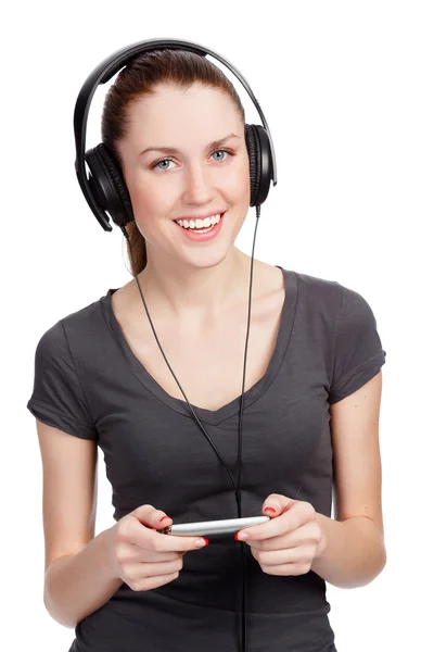 Pretty girl listening music and smiling to you — Stock Photo, Image