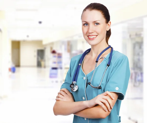 Söta kvinnliga läkare på ett sjukhus Stockfoto