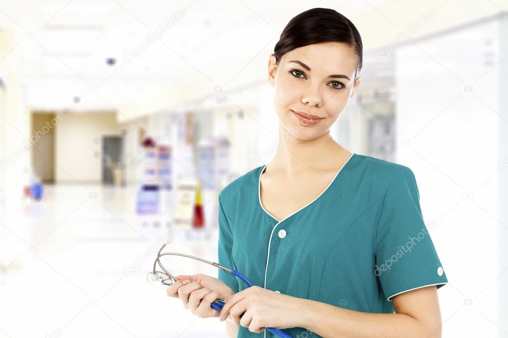 Cute female doctor in a hospital.