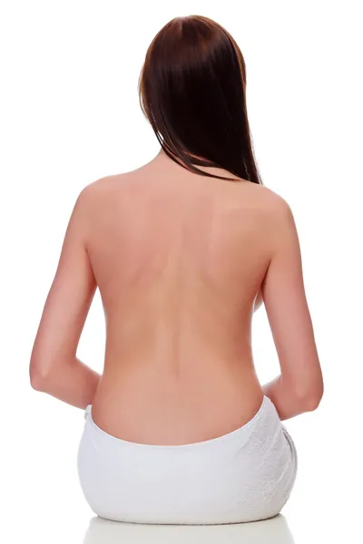 Nackter weiblicher Oberkörper vor weißem Hintergrund — Stockfoto