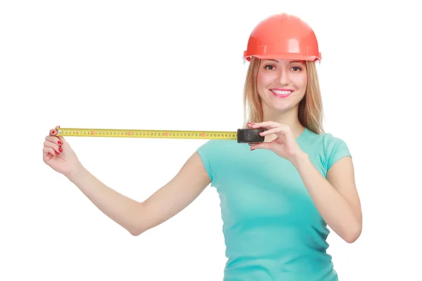 Woman in a helmet with tape measure — Stock Photo, Image