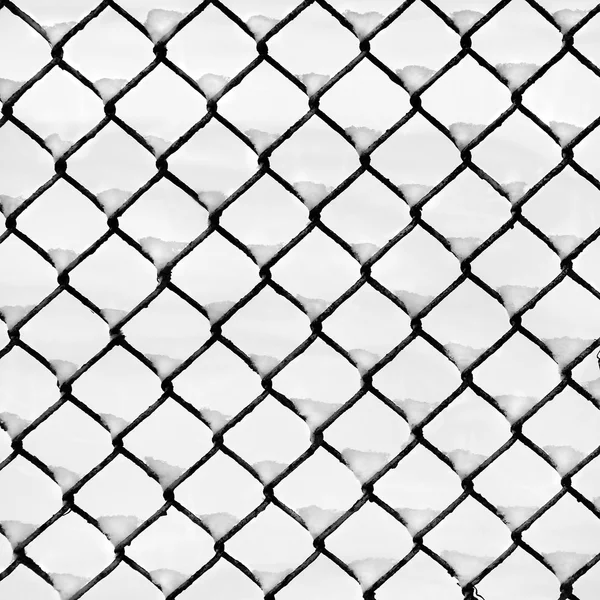 Winter snow-and-fence pattern. — Stock Photo, Image