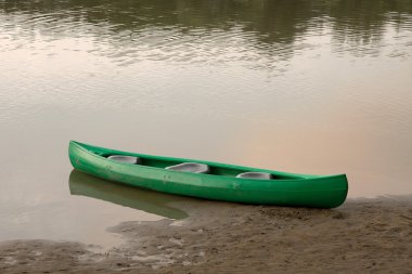 Canoe on the river clipart