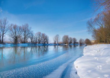 Snow-covered winter river clipart