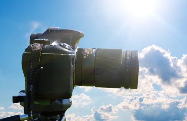 stock image Camera on tripod on sky background