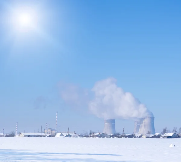 Nuclear power plant near the village — Stock Photo, Image
