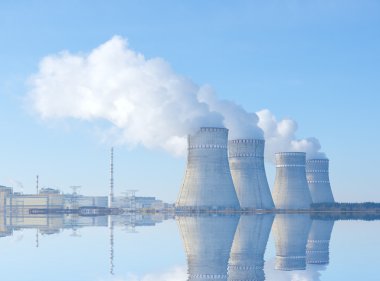 Nuclear power plant in a winter day clipart